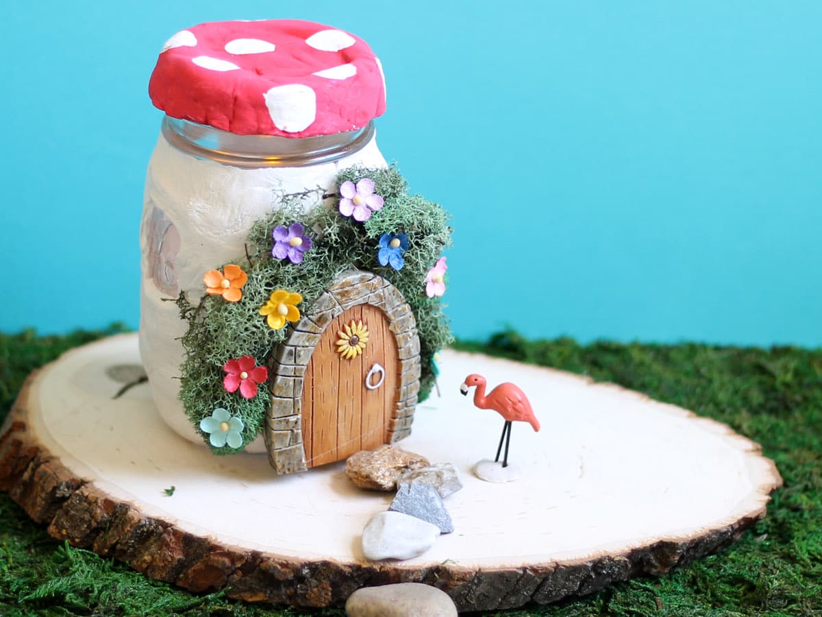 Fairy house idea: Air-dry clay and mason jars make a light-up fairy garden.