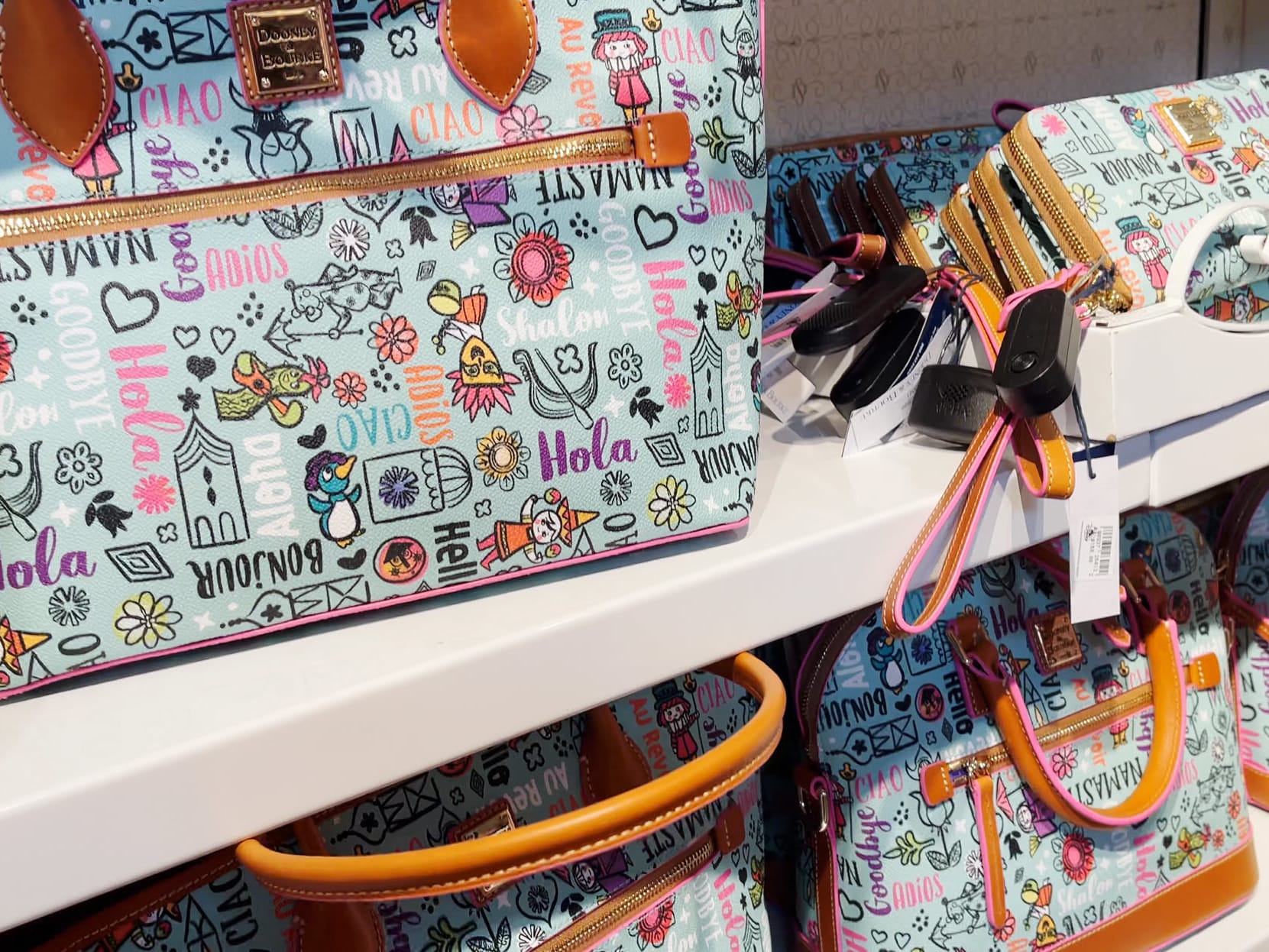 Dooney and bourke disney small world outlet