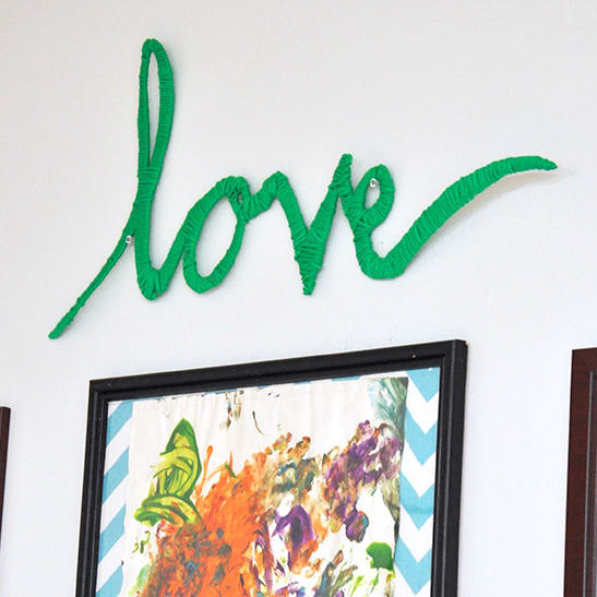 DIY COLORFUL WRAPPED YARN WALL ART - Showit Blog