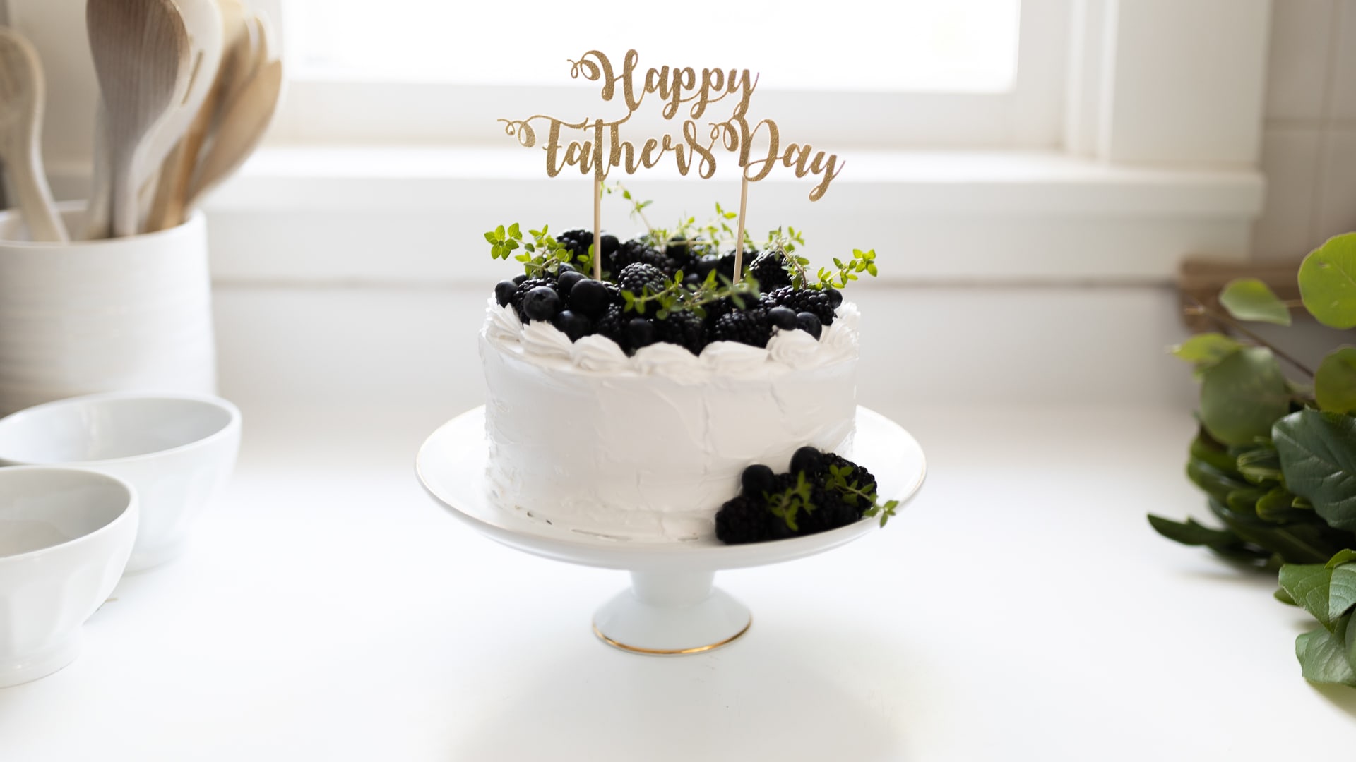 Use a Silhouette machine to decorate plain cake carriers.