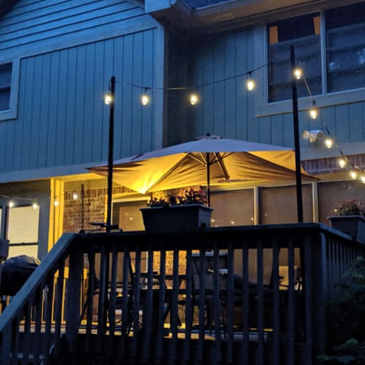 Installing string top lights on deck
