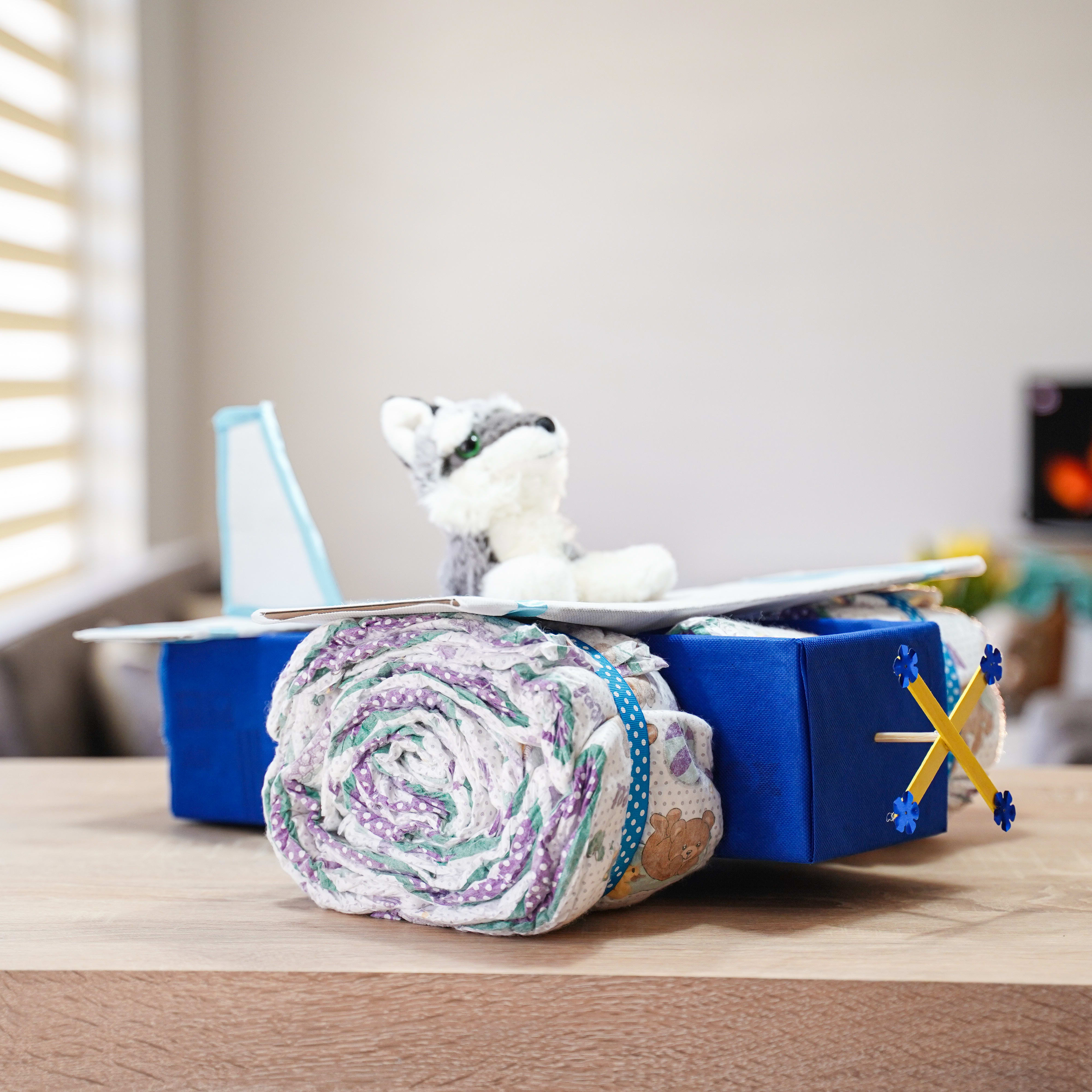 Airplane diaper best sale cake