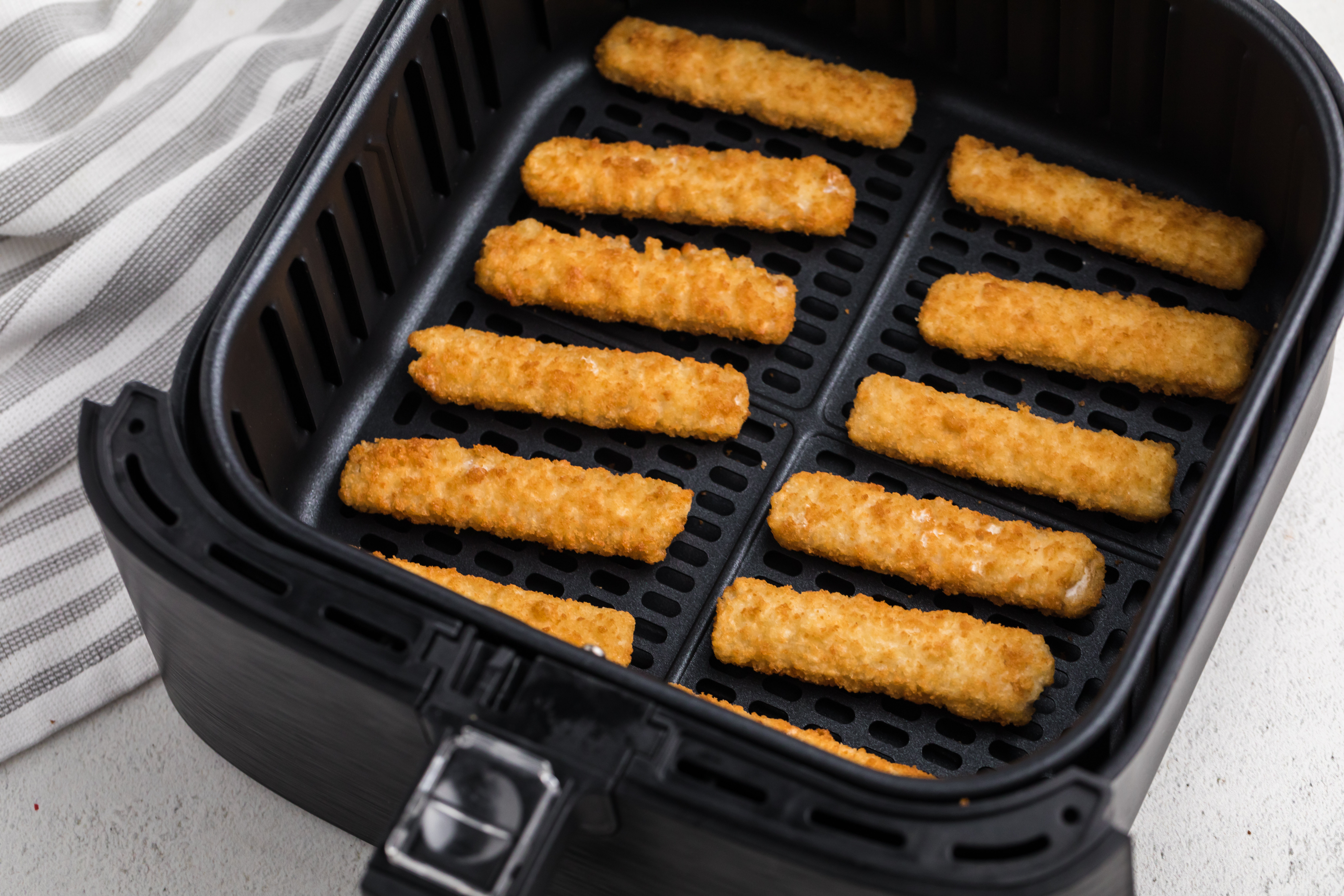 Air Fryer Frozen Fish Sticks - COOK THEM FAST