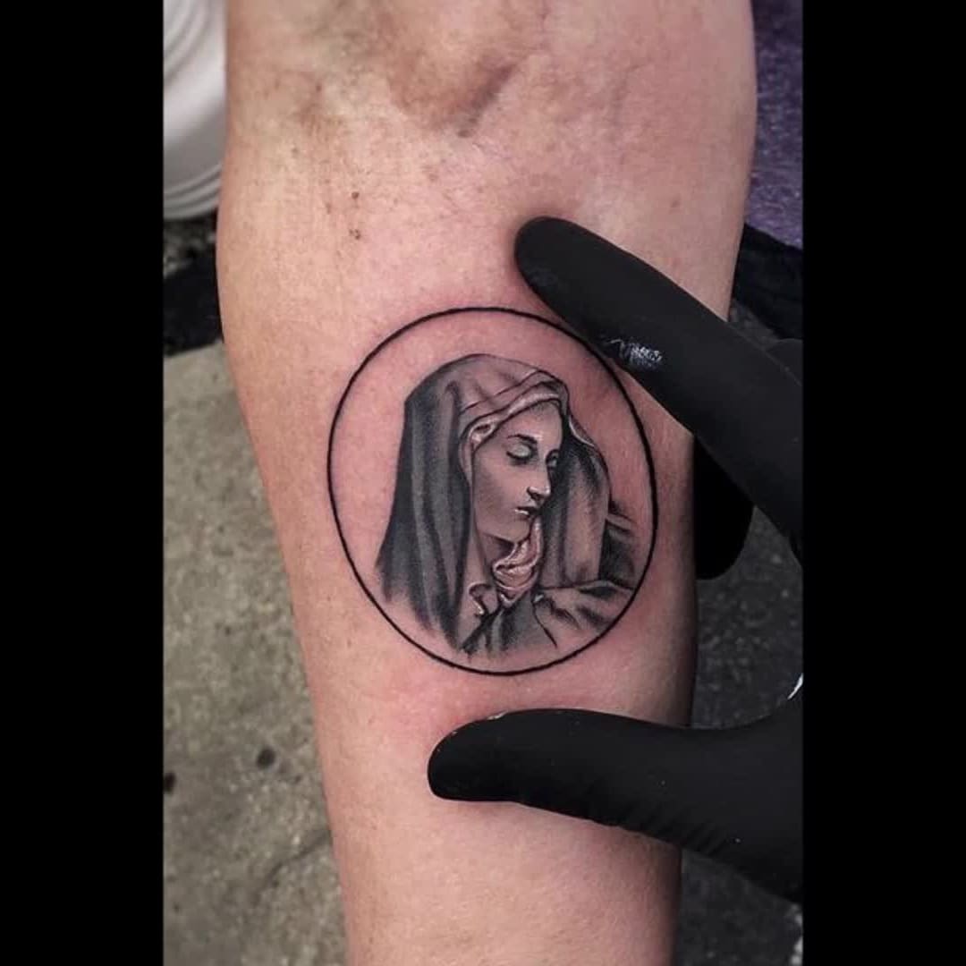Traditional virgin Mary Done by  Lucky Cat Tattoo Studio  Facebook