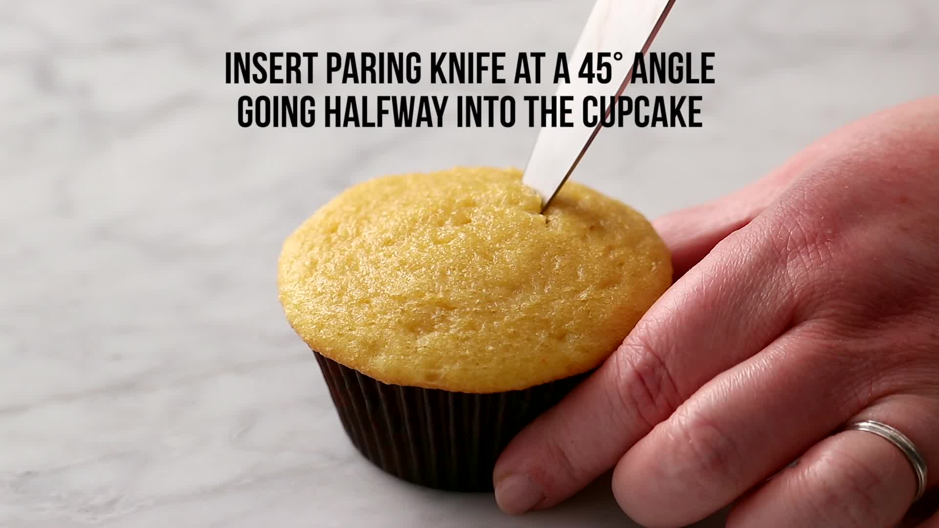 Cupcake scoop  This tool fills cupcake pans without the mess